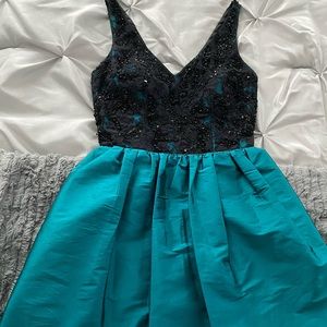 Black and blue lace dress with pockets